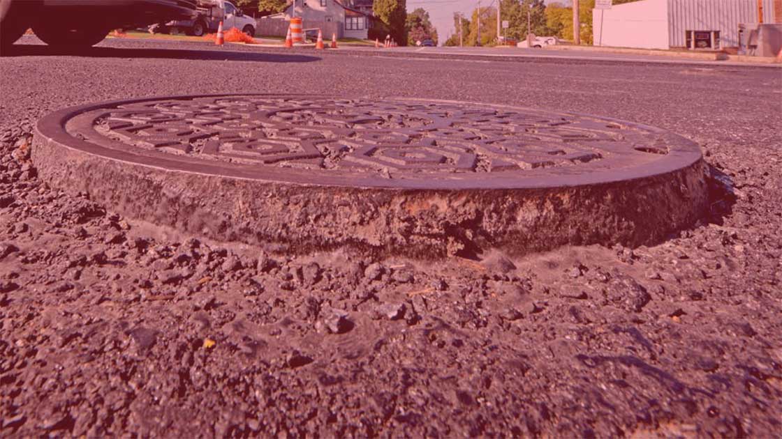 $675,000 Settlement for Woman Injured When Car Got Stuck on Raised Pothole