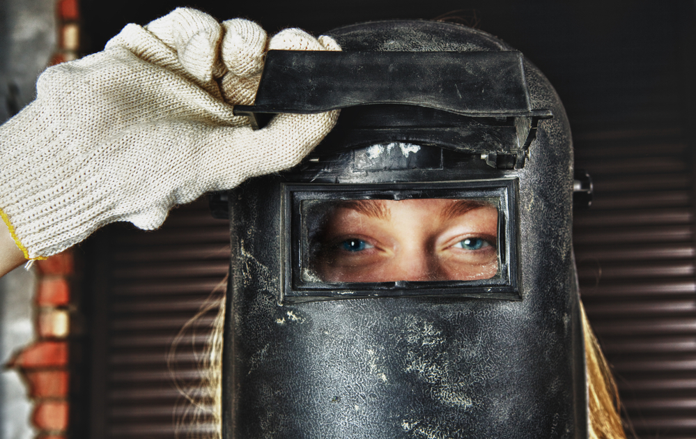 Common Types Of Racial Discrimination In The Workplace - Woman in Welder